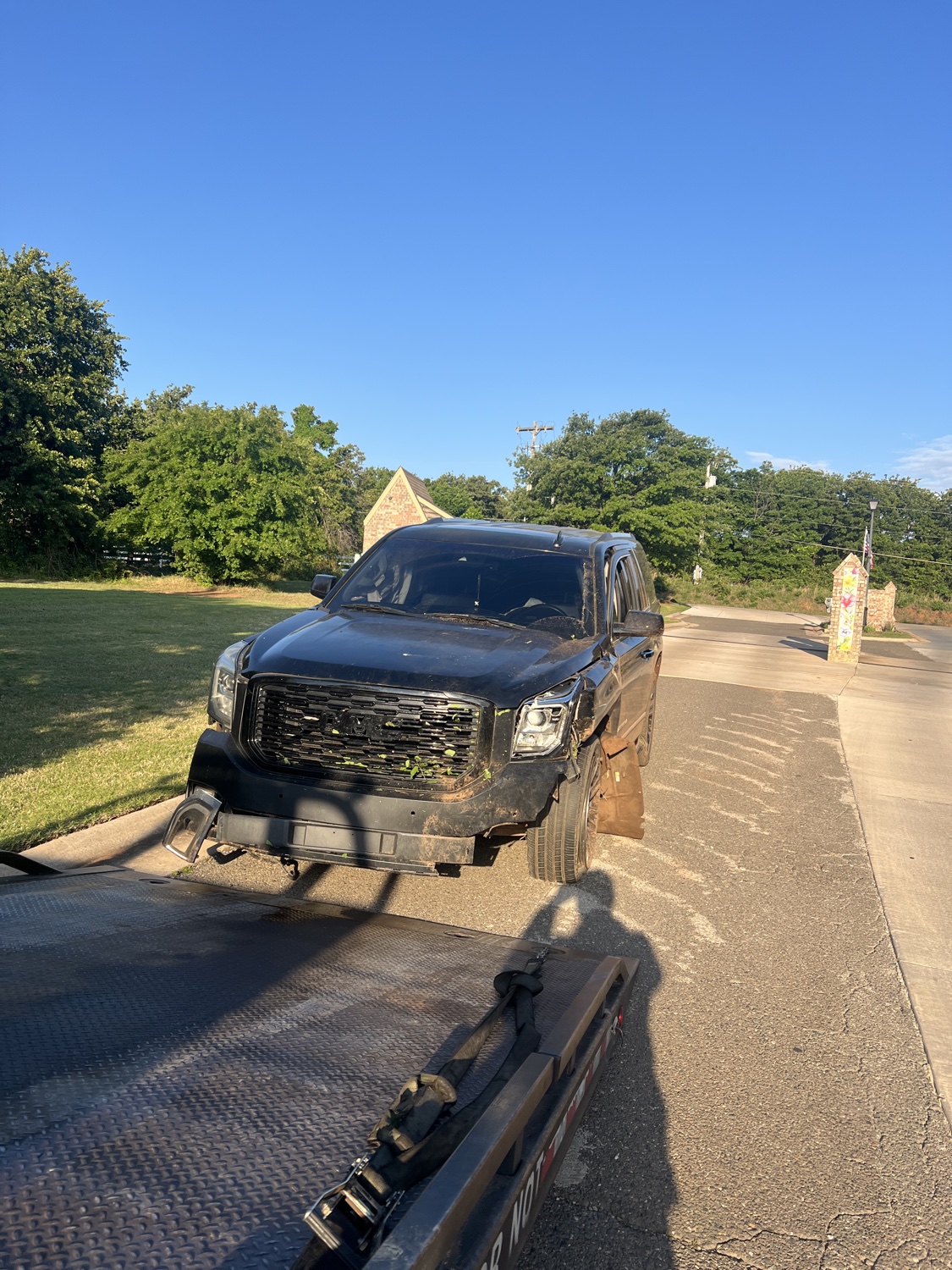 Sawa Towing flatbed recovering a vehicle after an accident