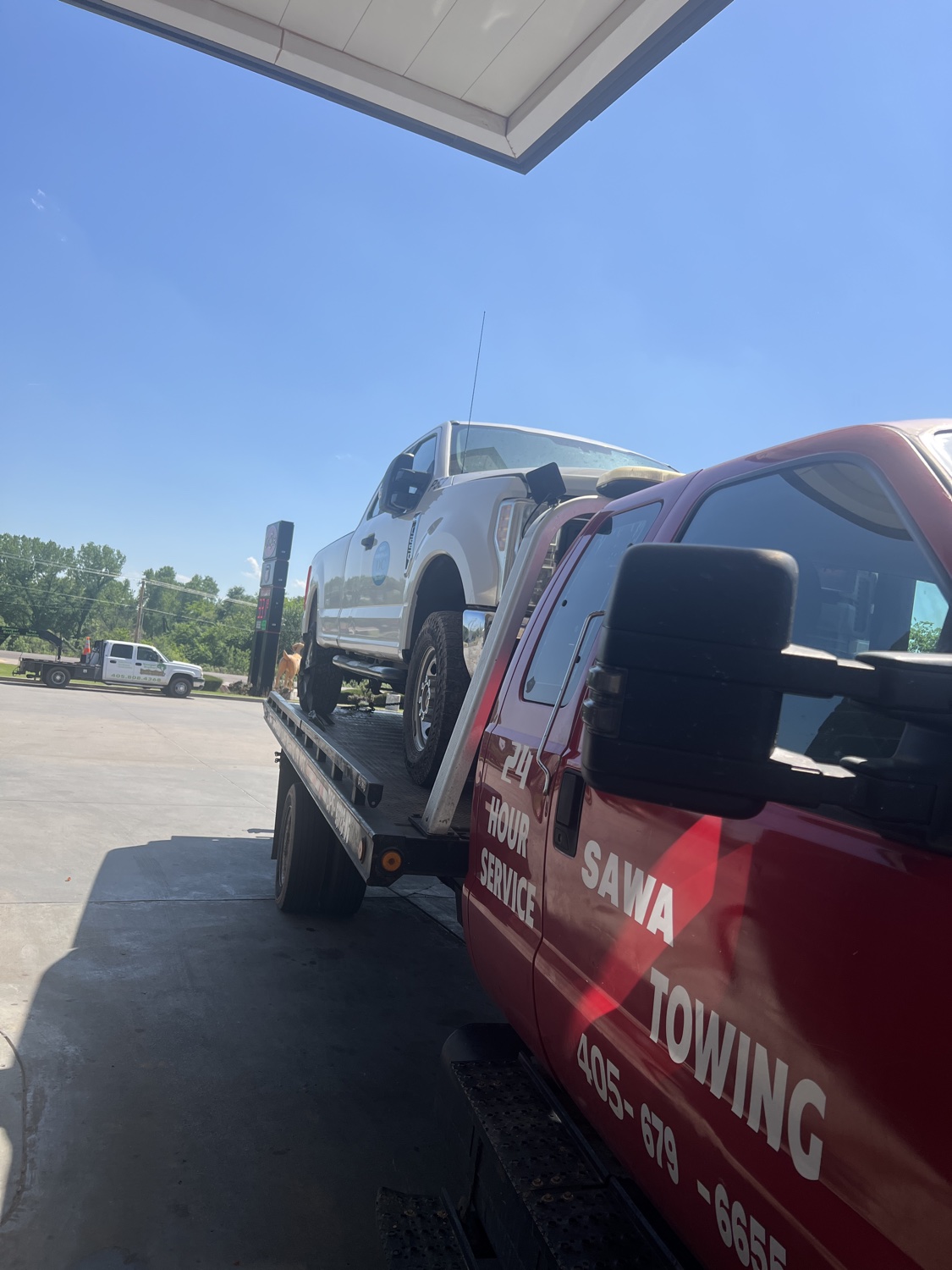 Sawa Towing flatbed assisting a vehicle in Oklahoma City